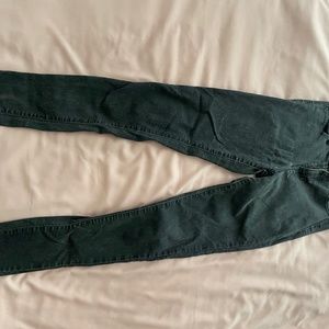 High-waisted distressed black jeans